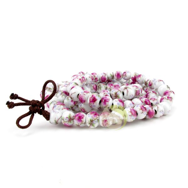 Guirlande tibétaine mala porcelaine fleurs roses 108 perles