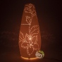 Éclairage tamisé lampe porcelaine ajourée fleurs d'hibicus