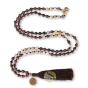 Mala 108 perles bois de santal et oeil de taureau charme fleur de vie et OM plaqué or